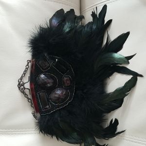 Cabrelli & Co feather and beaded black clutch